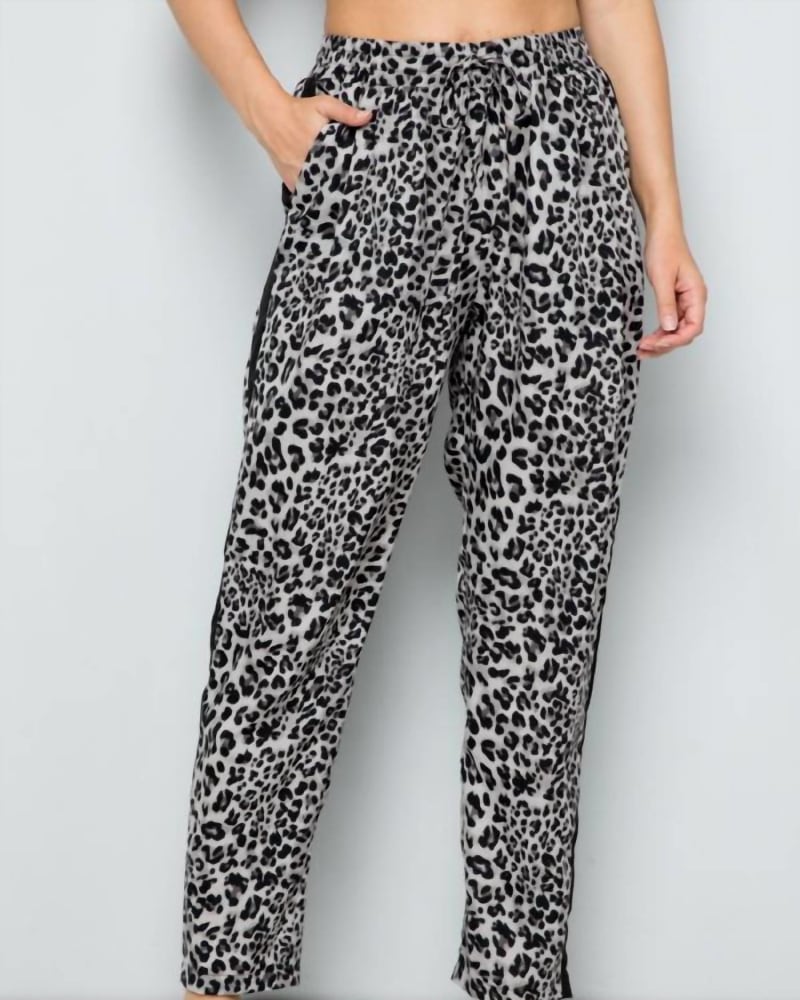 Front of a model wearing a size Large Leopard Print Straight Leg Pants In Grey in Grey by SEE AND BE SEEN. | dia_product_style_image_id:359670